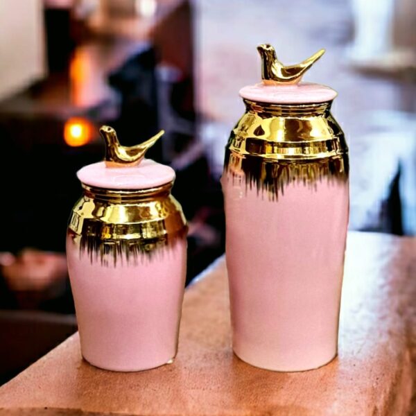 A pair of candy jars on a table